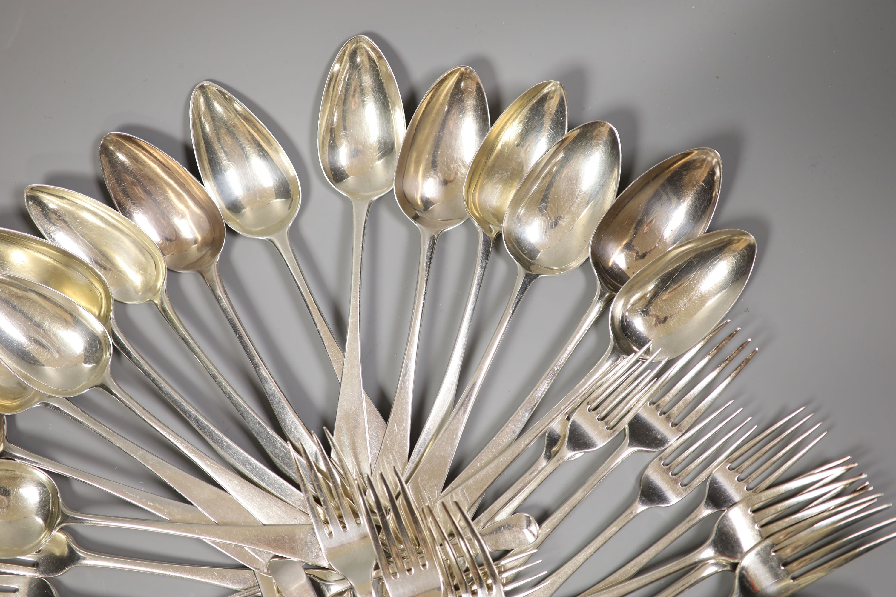 A matched part canteen of 19th century Old English pattern silver flatware, various dates and makers